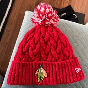 New Era Women’s Red Pom Knit Beanie with Chicago Blackhawks Logo